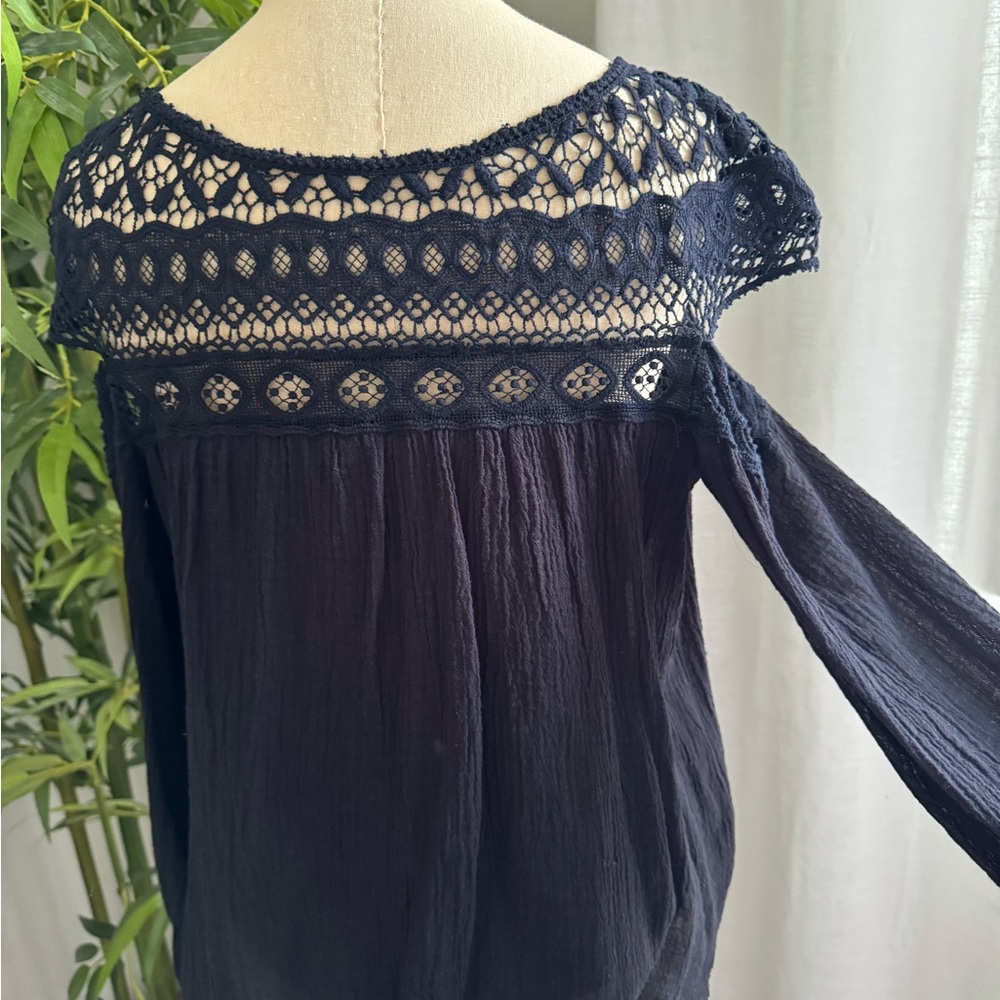 Beautiful lace, detailed cut out shoulder top by Bailey/44.